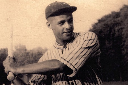 Boomer harding photo from 1934 holding baseball bat