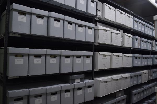 Archival boxes on shelves