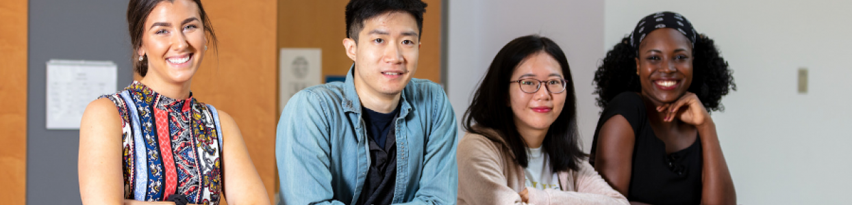 4 International Students smiling