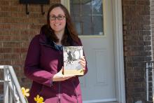 Sarah Glassford holding new book