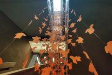 An installation in the Leddy Library contains about 6,000 small orange shirts, the unofficial number of unmarked graves of Indigenous children found on the grounds of former residential schools in the U.S. and Canada.