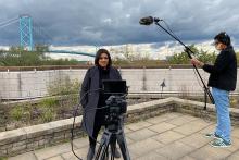 A film crew records historian Irene Moore Davis as part of a project documenting stories of Sandwich.