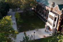 Arial photo of the UWindsor Dillon hall building with students walking around.