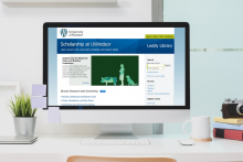 Computer with the Scholarship UWindsor webpage on screen.