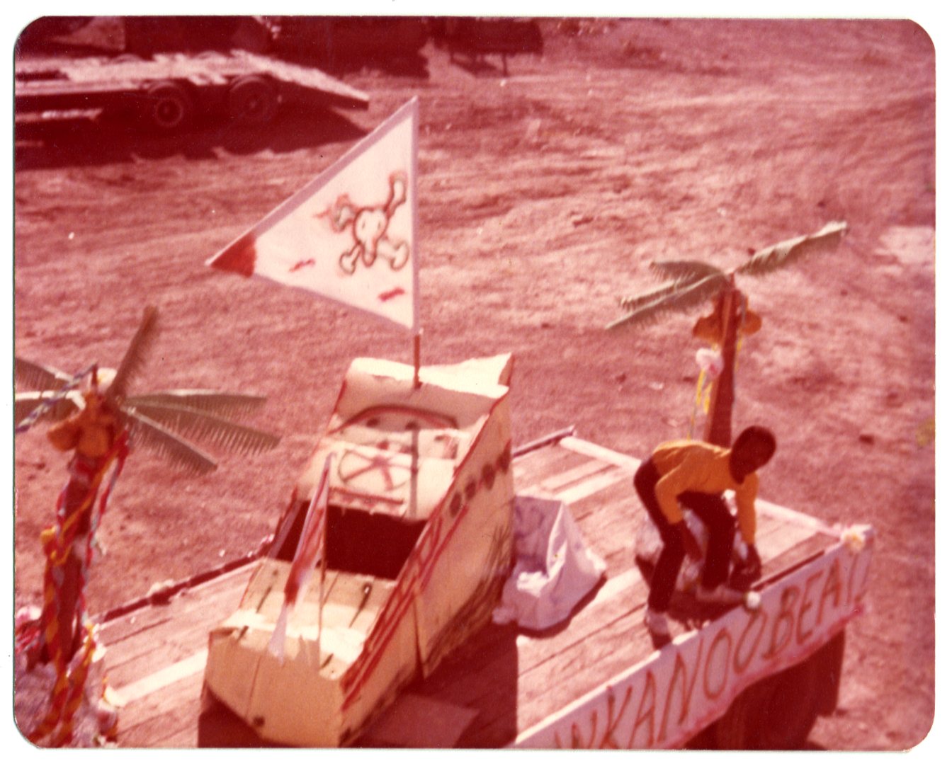 Caribbean male student on parade float of Caribbean Students Association of University of Windsor in early 1980s